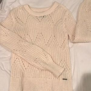 Cream sweater never worn. Cuffed sleeves